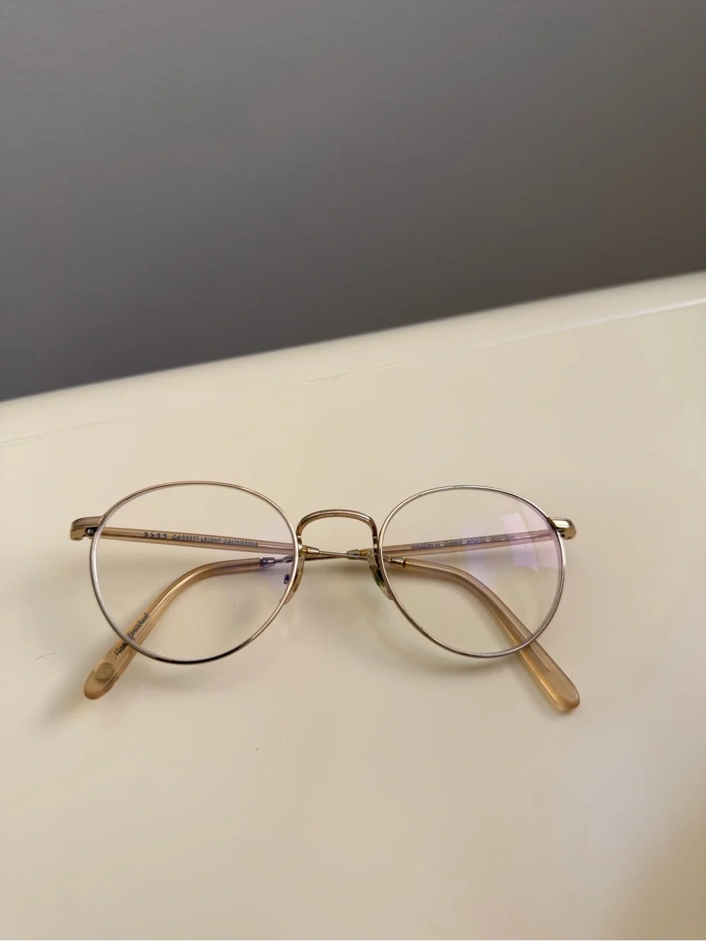 Garrett Leight Round Gold Metal Frame Glasses with Light Brown Temples